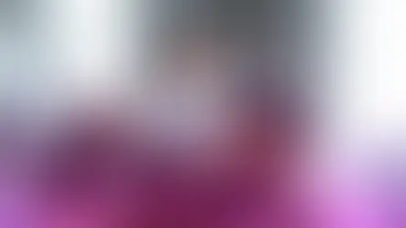 Four people in a meeting room, engaged in discussion. One stands, talking on a phone. Text: Customer Experience, Loyalty Marketing.