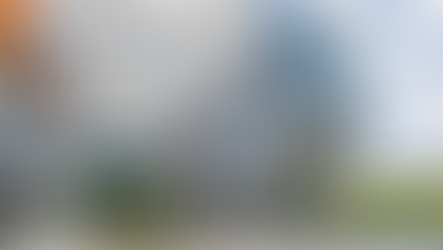 Exterior view of Alibaba’s headquarters in Hangzhou featuring the modern geometric lattice architecture and glass buildings.