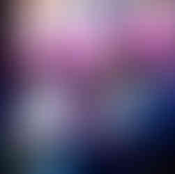 Insightful exchange underway as industry leaders deliberate on the future of talent development under the vibrant glow of the stage lighting.