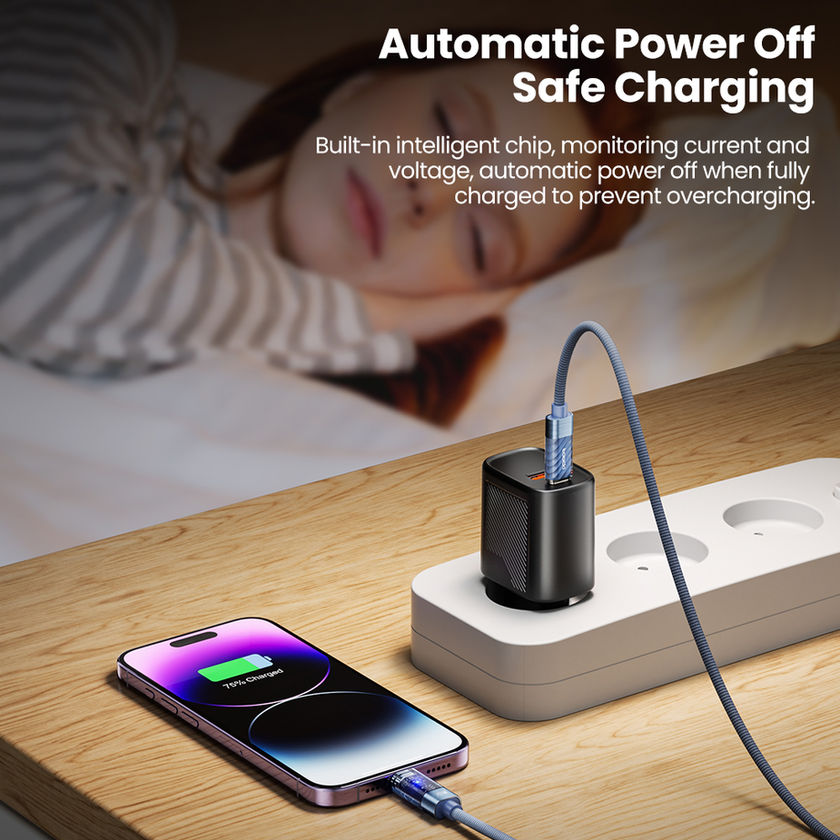 Toocki USB-C to Lightning cable charging an iPhone overnight from a wall charger on a bedside table