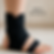 a person wears ankle brace to relieve her ankle arthritis