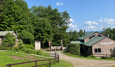 Base Camp lodge and cabin on a sunny summer day in Vermont's Northeast Kingdom