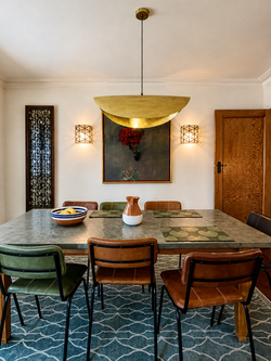 Eclectic dining room in an apartment in Ealing Village