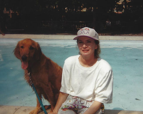 owner of Charlotte City Pets with golden retriever