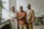 portrait-smiling-african-american-team-posing-photo-modern-office.jpg