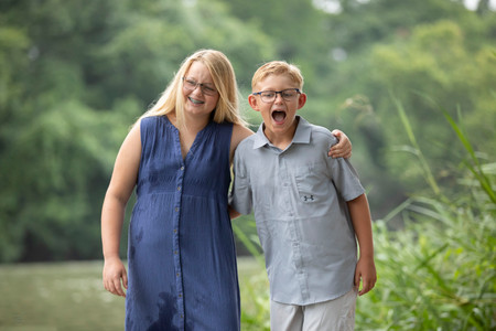 brother and sister in photo session in Bastrop TX along Colorado River