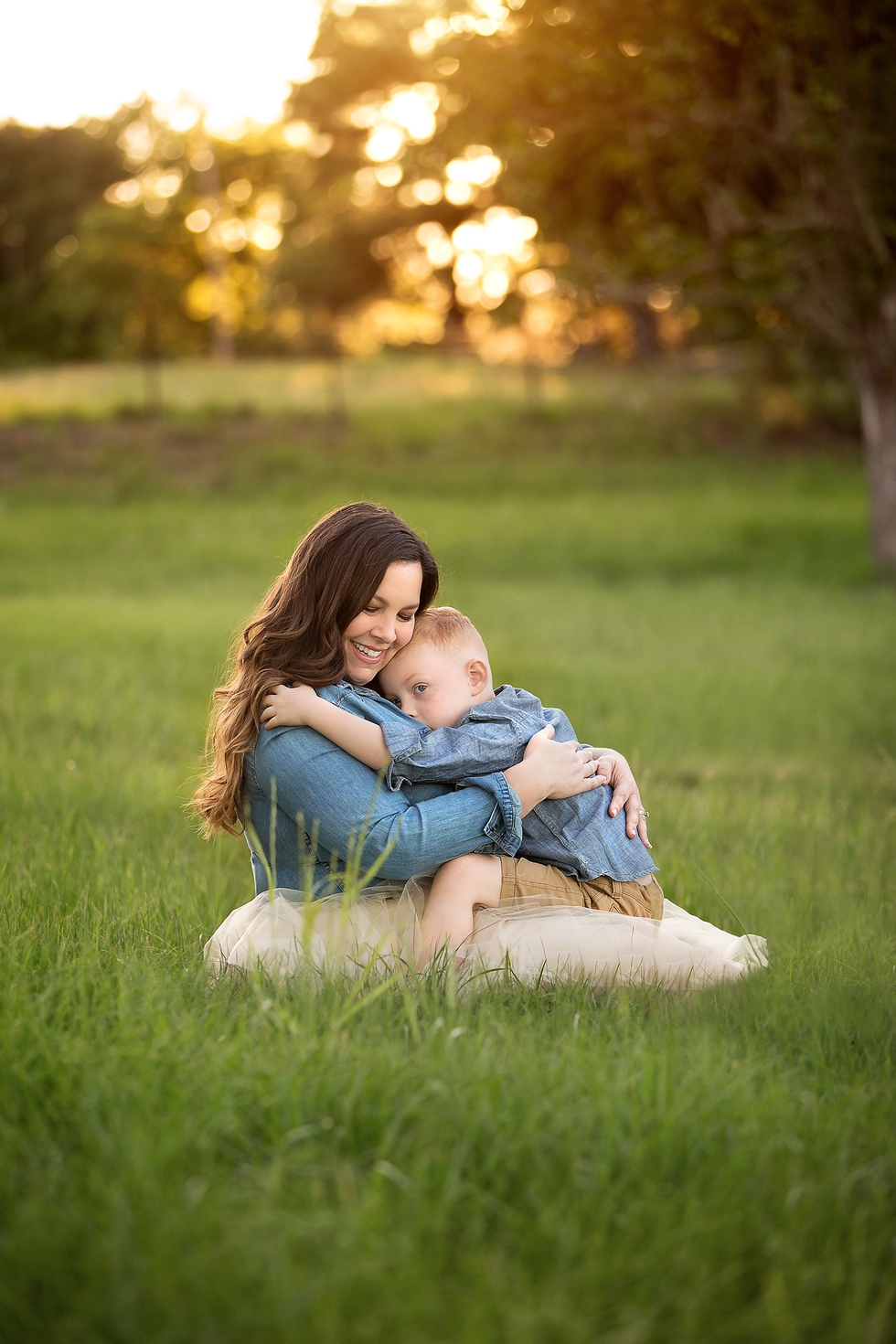 Mommy & me mini session. Mom and son hugging.
