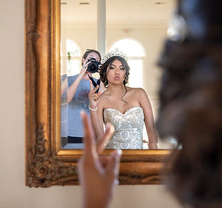Rebekah photographing a quinceanera client. 