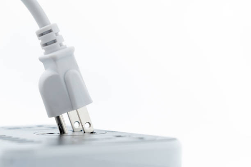 When an electrical outlet has come loose or it has gone bad, the outlet will typically make a buzzing sound. In this case, keep an ear out for this noise, and call a trained electrician to repair or replace the outlet to get it working safely again!