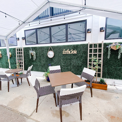 Ludlam Bar & Grill gives a true beach vibe as it is outdoors and is the place to be! Ludlam Bar & Grill offers live music, daily specials, an updated menu, and an ideal location, making it the perfect place to unwind after a long beach day with friends and family.