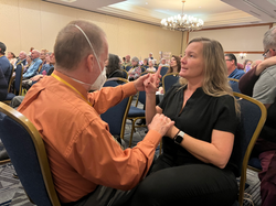 two people using ASL