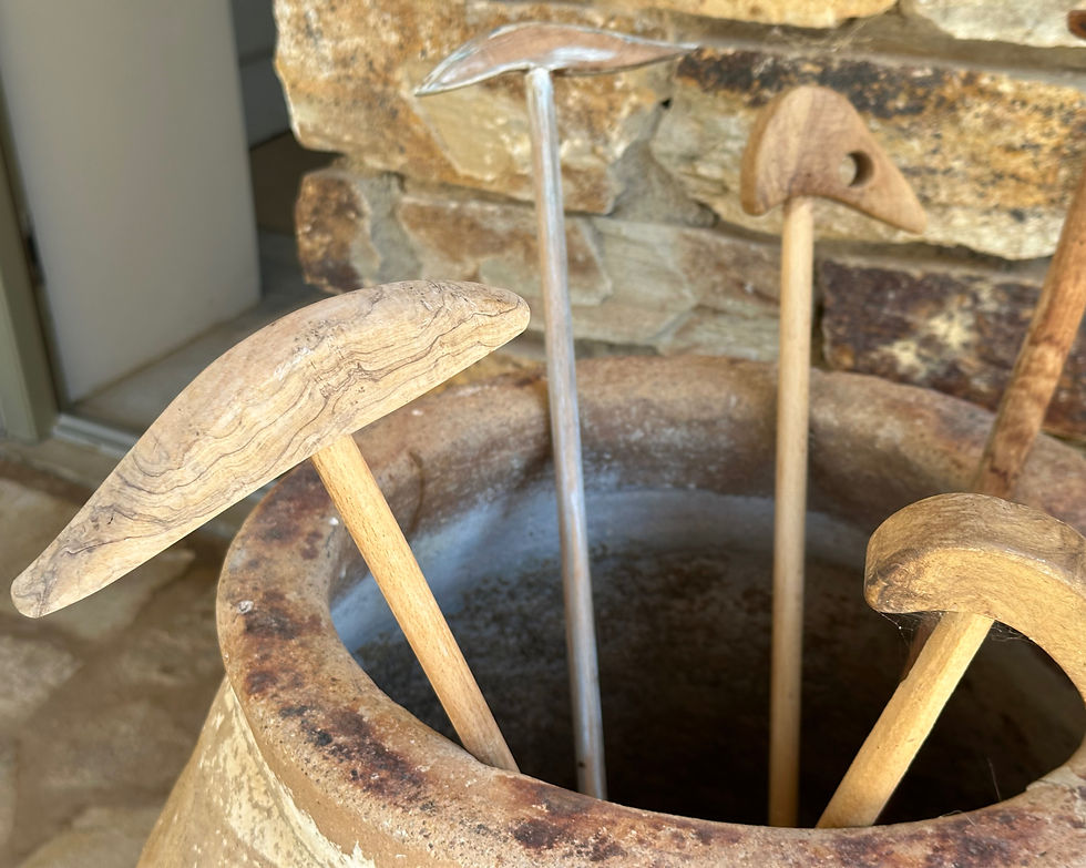 A collection of glitsa — traditional Greek shepherd’s sticks — gathered in an old terracotta pot, ready for walks in the surrounding countryside. Simple, useful objects like these can say more about a Mediterranean home than anything deliberately decorative..