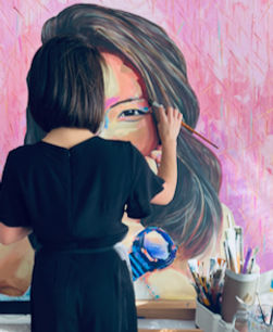 Artist Yvonne Gallagher working on a portrait commission