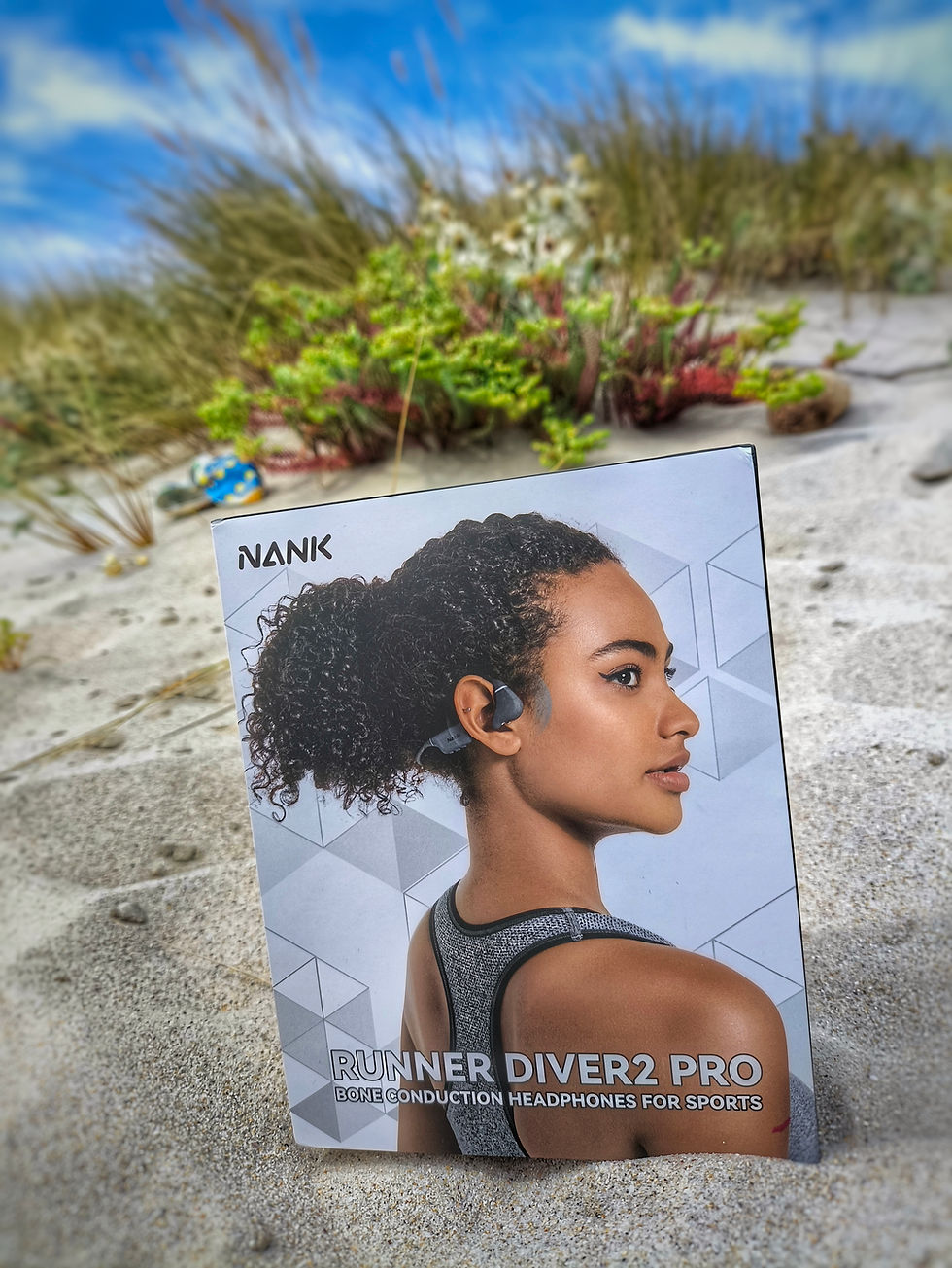 packaging de los Auriculares Runner Diver2 Pro en la playa