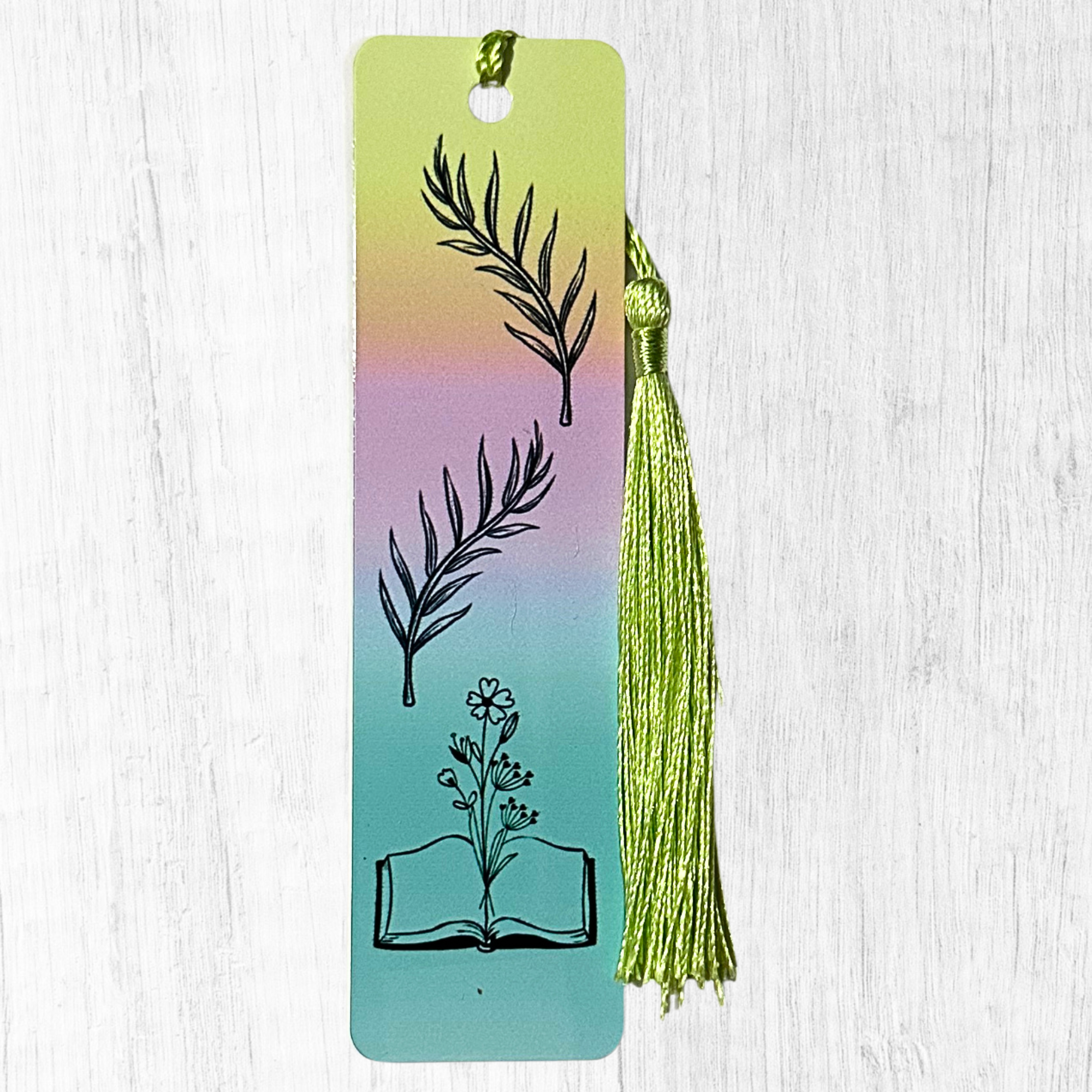 Ombre bookmark with book and flowers illustration and tassel