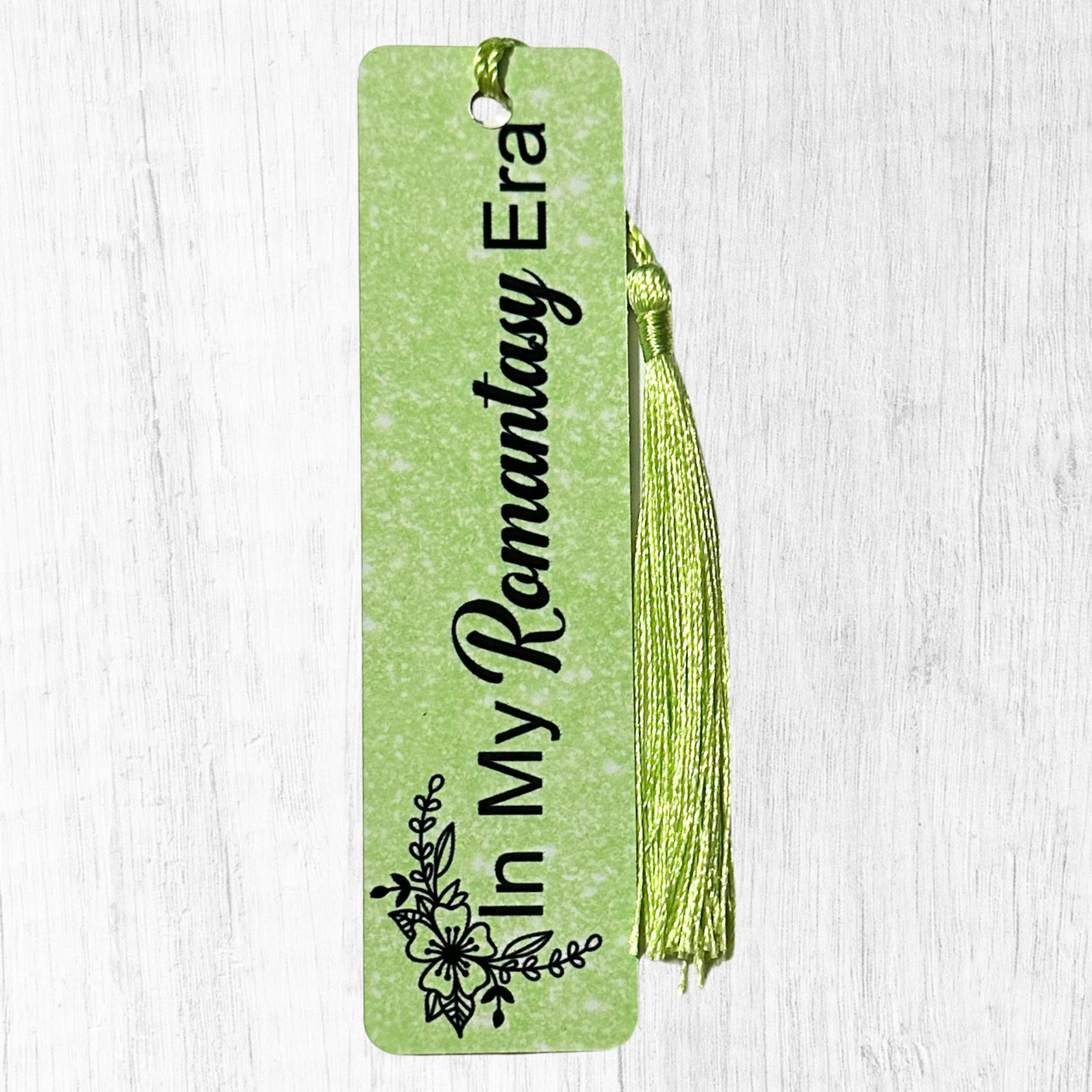 Green glitter bookmark with “In My Romantasy Era” text and green tassel