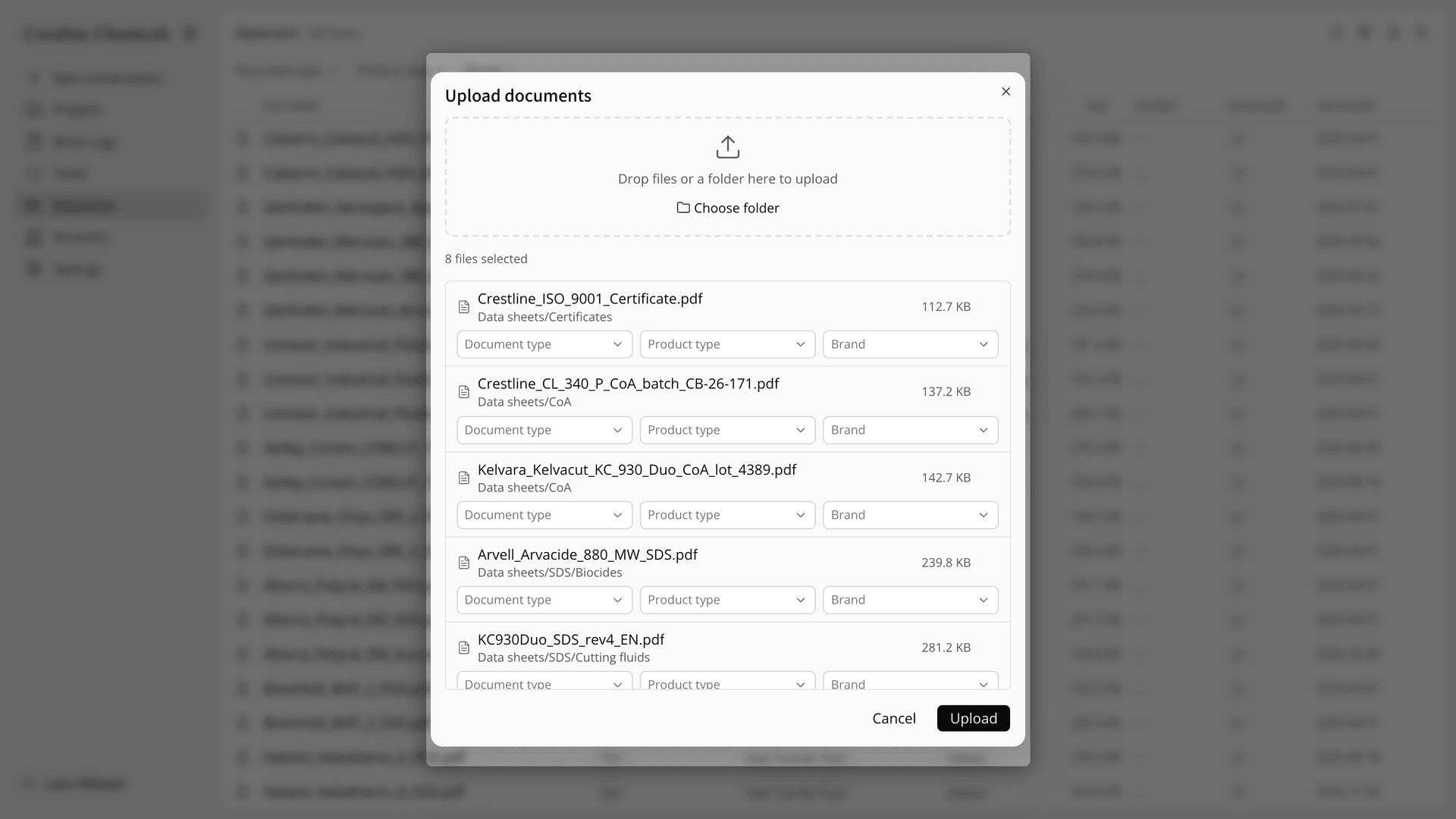 The Upload documents dialog after a folder from a sample brand was dropped in, with 8 files selected and their folder paths listed.