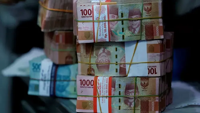 Indonesian finance minister's removal unnerves investors, rupiah tumbles