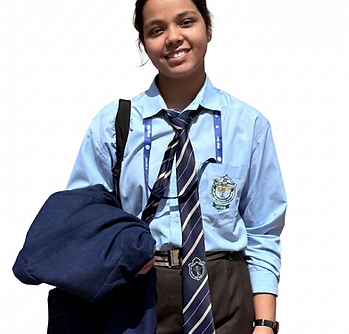 Smiling student in school uniform for academic coaching.