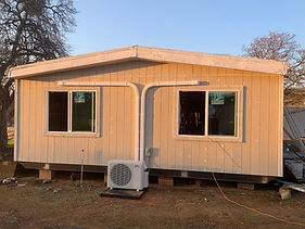 Ductless mini split outdoor condenser unit installed at a manufactured home in Cocke County, near Newport TN — efficient cooling for rural East Tennessee properties.