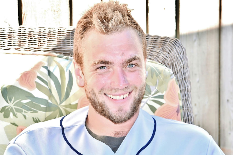 handsome-smiling-young-man-with-a-trimmed-beard-2026-01-07-05-34-06-utc.jpg