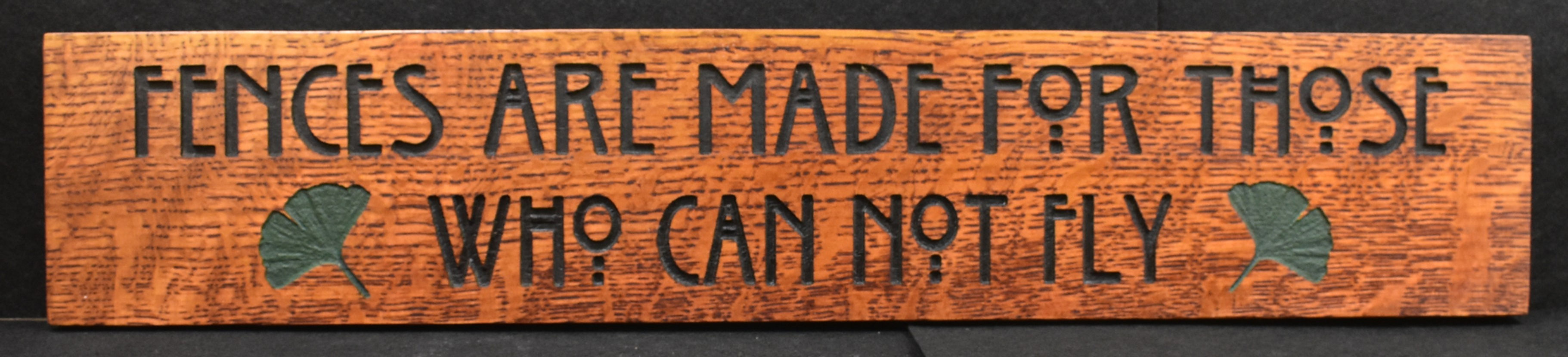 Fences Are Made For Those Who Cannot Fly (22" x 4 1/4") In Oak