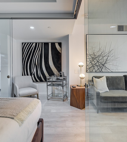 Apartment with a couch, sofa and lamp