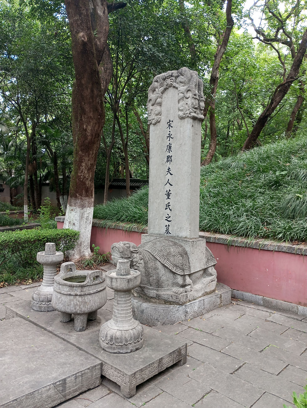 The funerary stones and the three stone supports for the sacrificial offerings