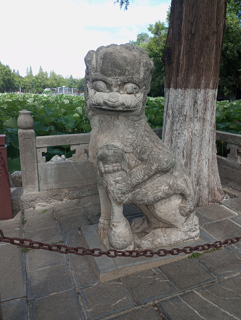 The lion statues guarding the bridge