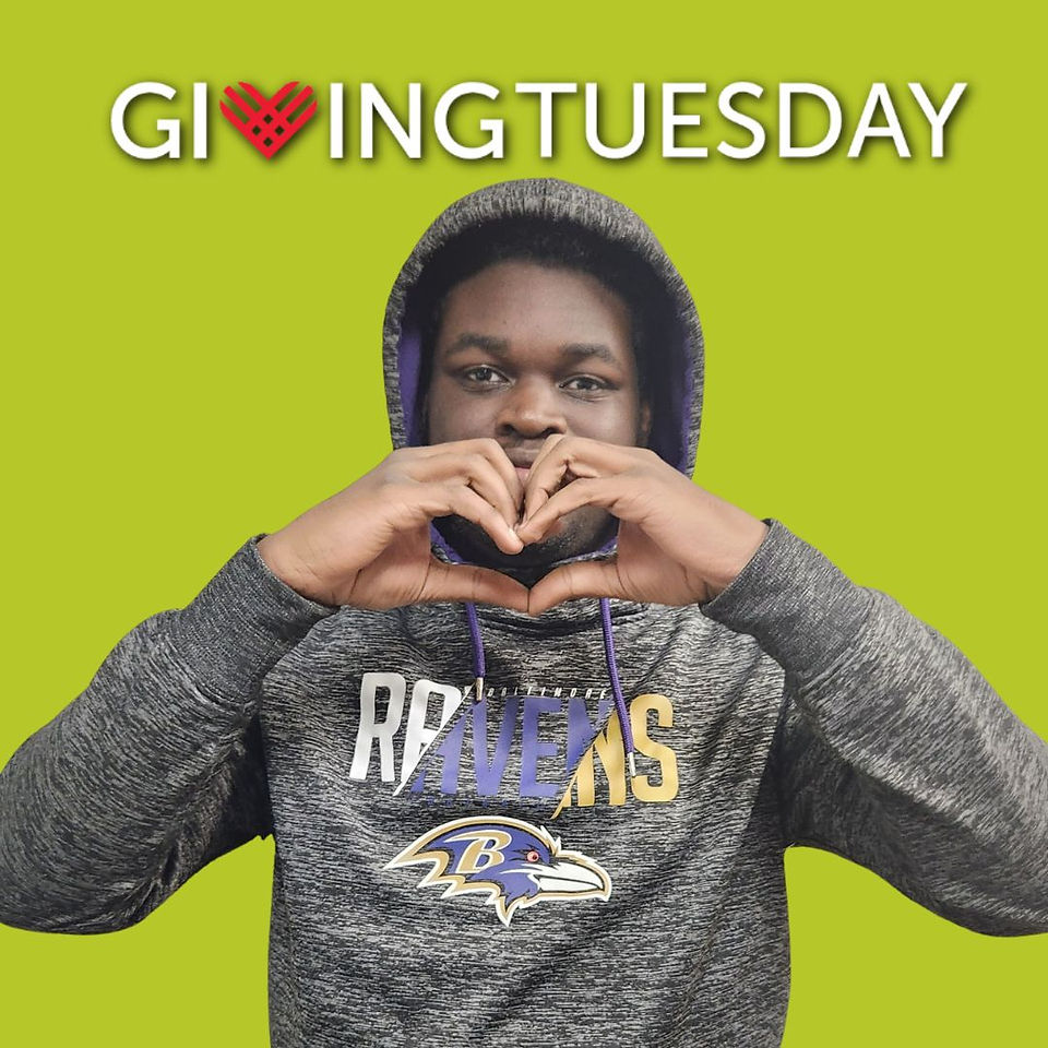 Marvin Gordon JP Osborne with heart hands and Giving Tuesday Logo with green background