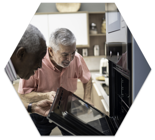 Friends checking food in the oven.png