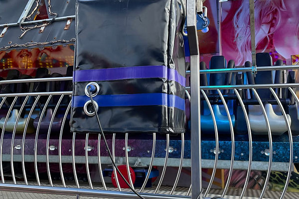 fairground ride with PVC cover for protection
