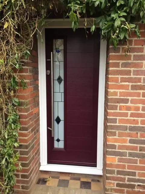 burgundy composite door with slim glass insert