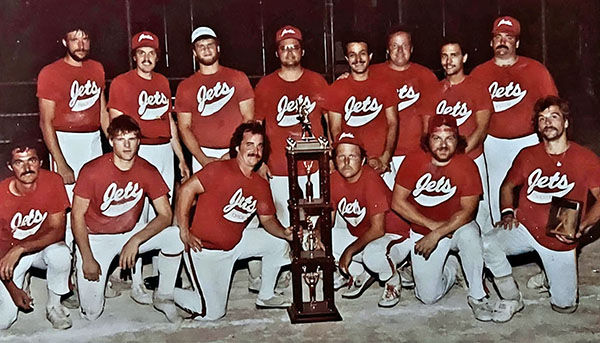 (Above) The 1985 Chicago Jets. Bottom row, left to right: Dale Hopkins, Bradley Trychta, Bobby Glover, Clarence “Boots” Cass, Pat Carroll, and Keith Dickens. Top row, left to right: Ricky Lewis, Chris D’Agostino, Robert Placek, Kenny Dower, John Zullo, John Clausen, Joey Alvinito, and Gene O’Keefe.