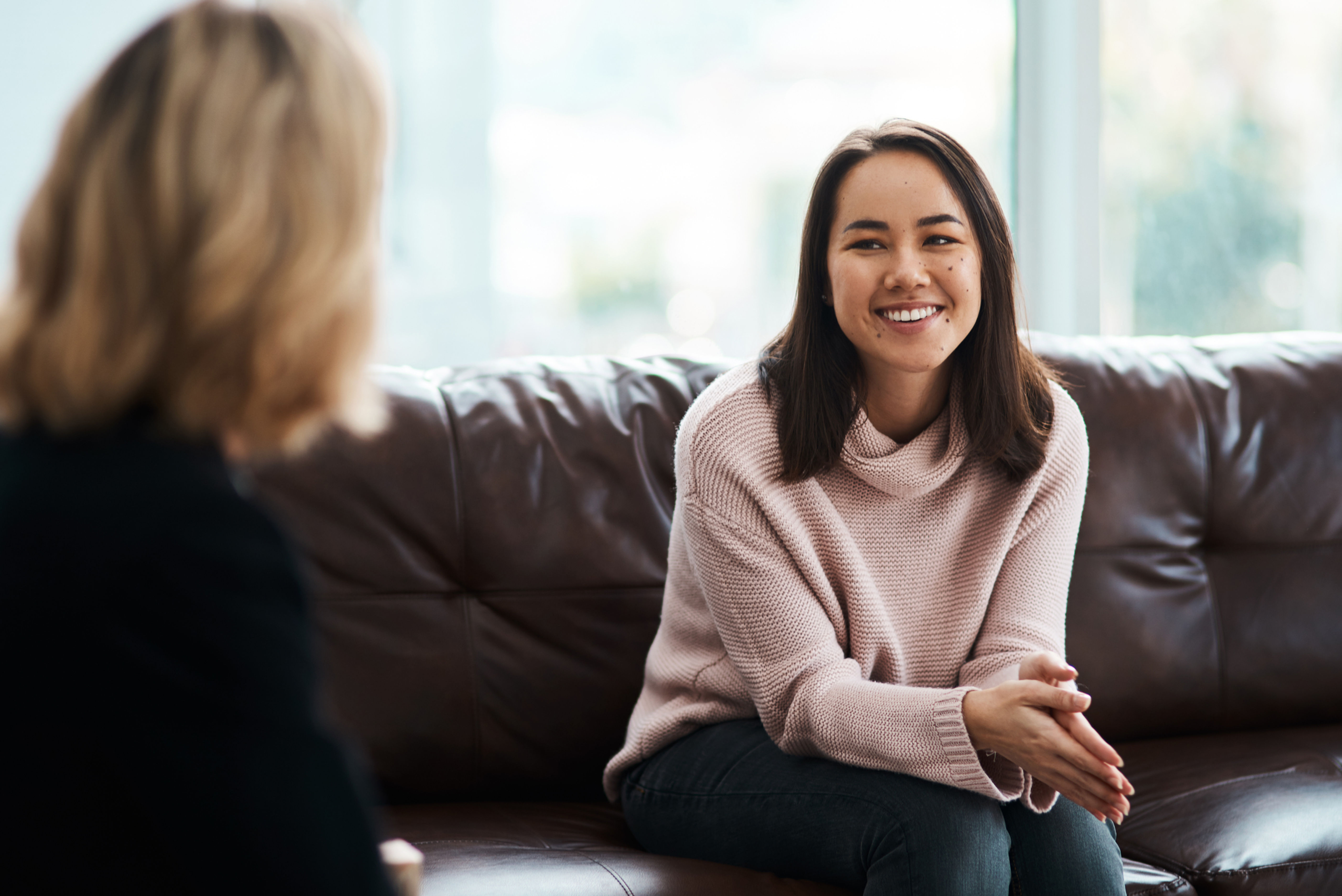 Smiling woman in individual counseling