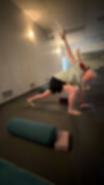 Person in extended side angle yoga pose