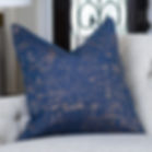 Navy blue throw pillow with bronze brush strokes