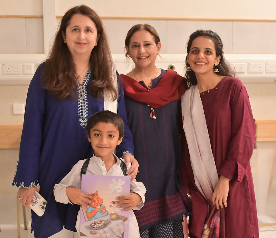 With Nusser Sayeed, Saniyah Salman and an excited young patient. 