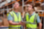 stock photography warehouse workers with reflective vests