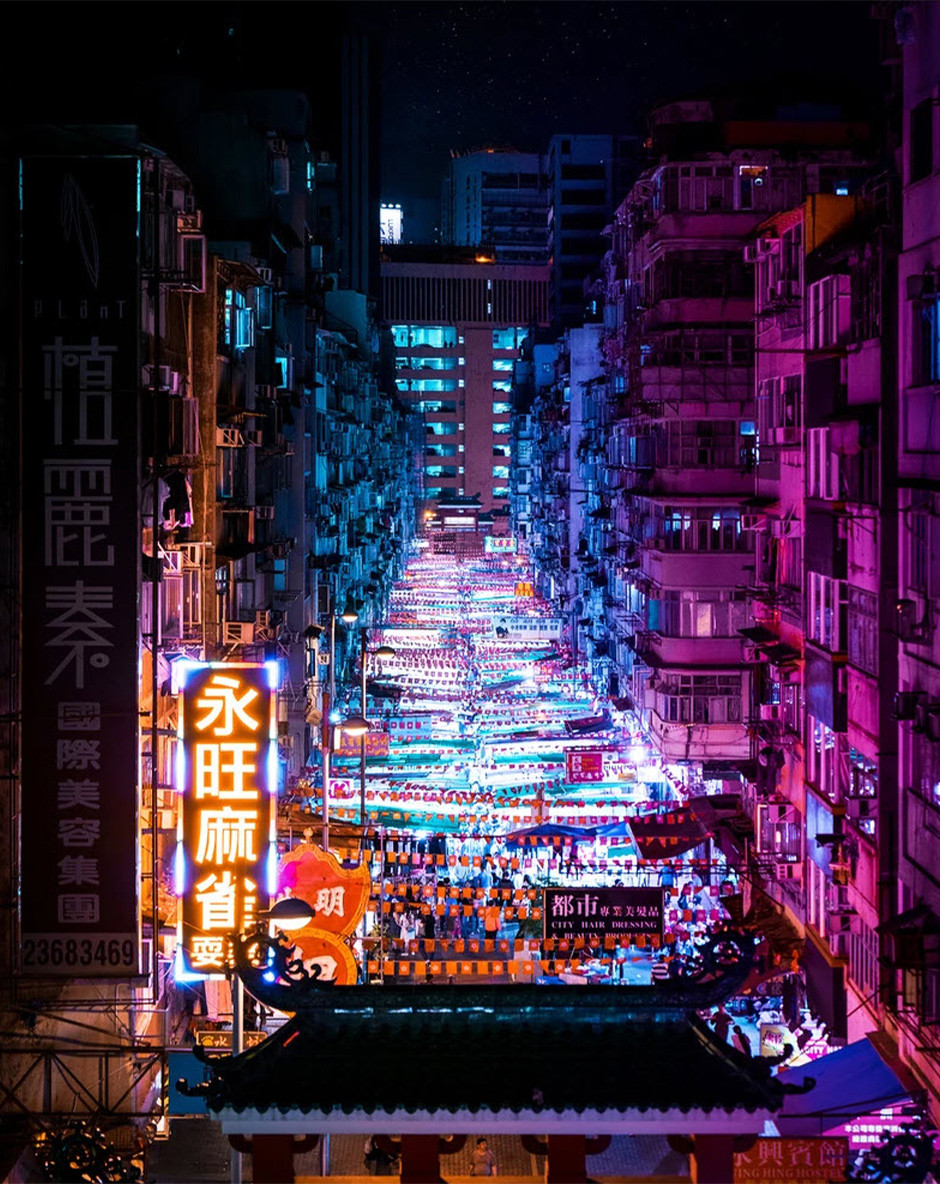 vertical urban landscape of Hong Kong night streets