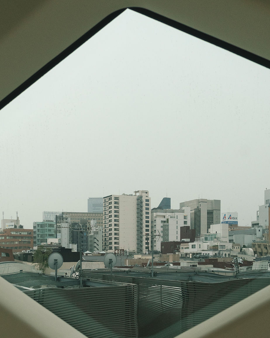 city photography framed on window