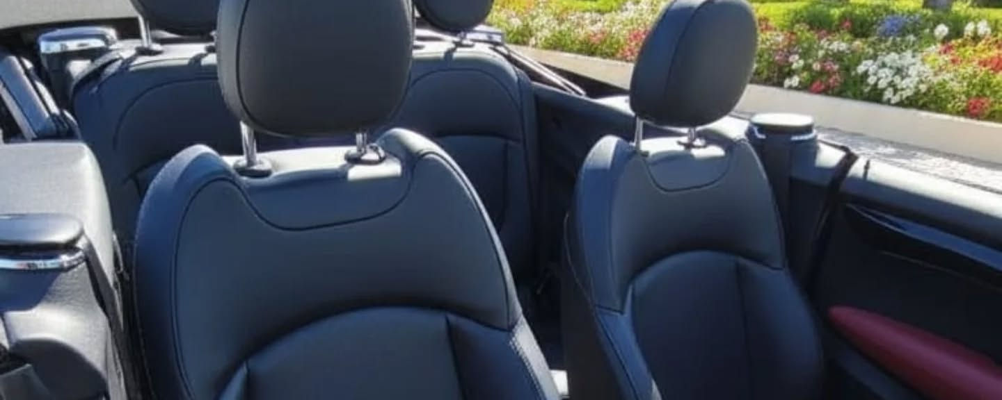 Rear seats inside Mini Cooper JCW compact sports car rental in Marbella