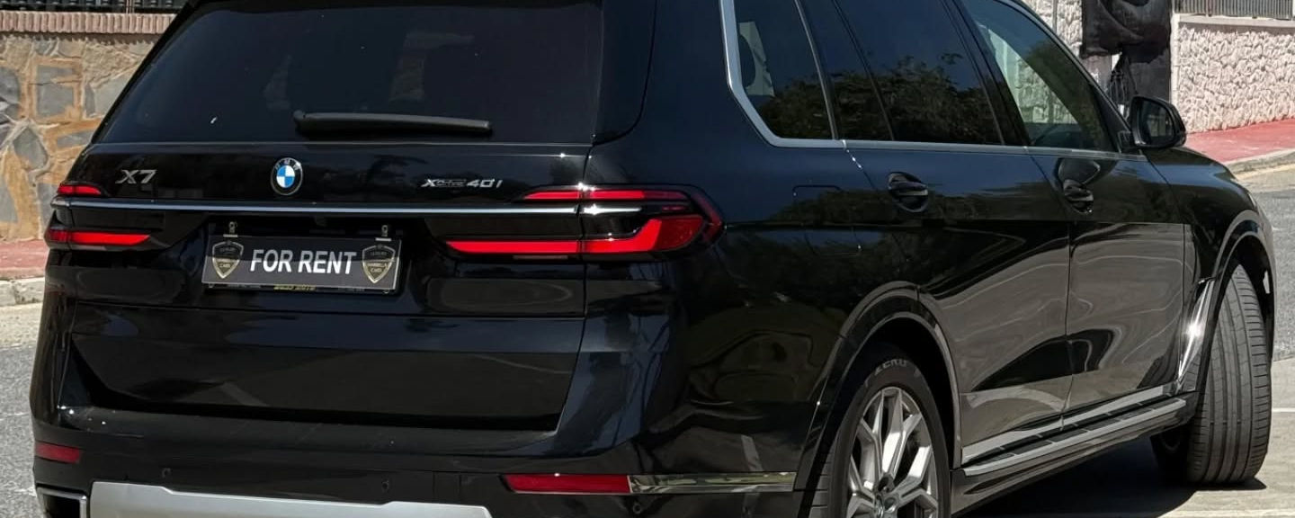 Rear view of BMW X7 premium SUV rental in Marbella