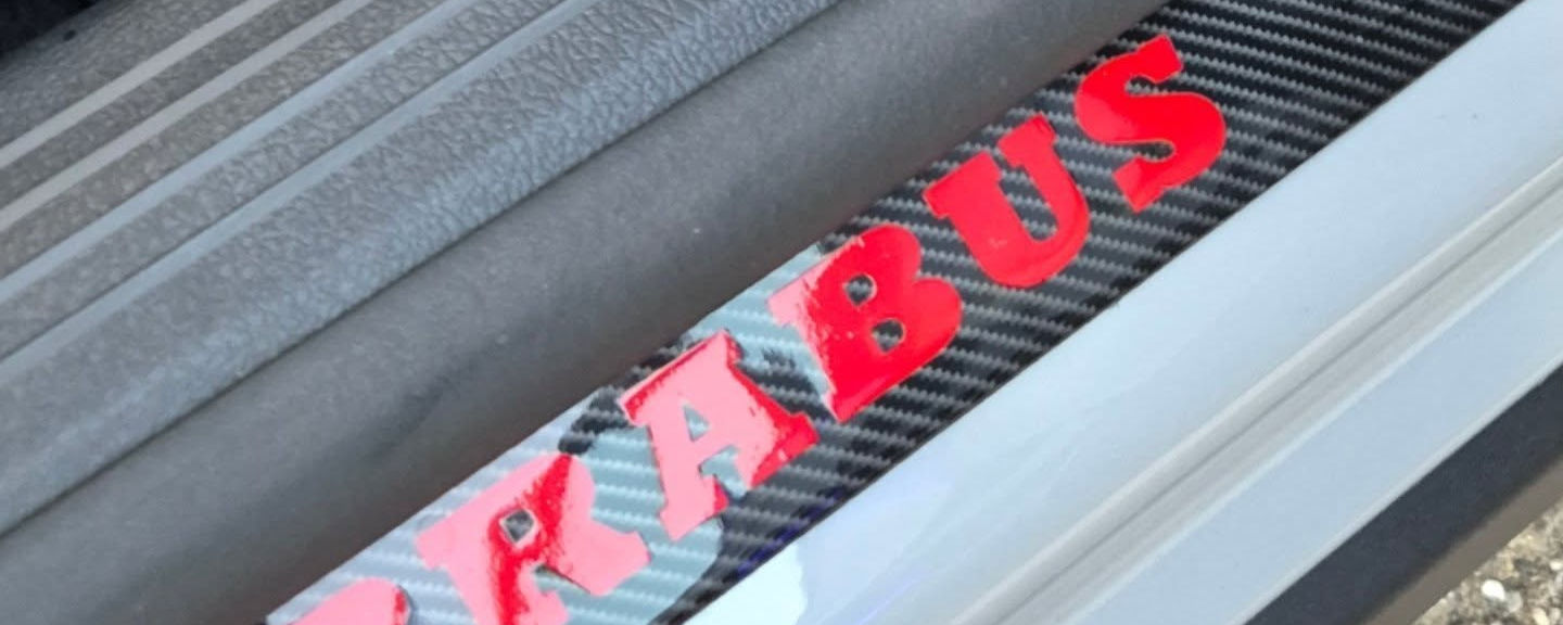 Brabus logo detail on side skirt of Mercedes GLA SUV