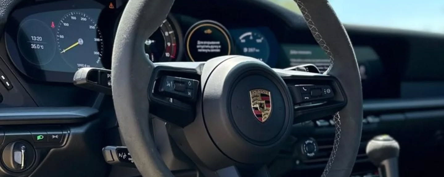 Porsche 911 GT3 cockpit with racing-inspired controls and performance layout