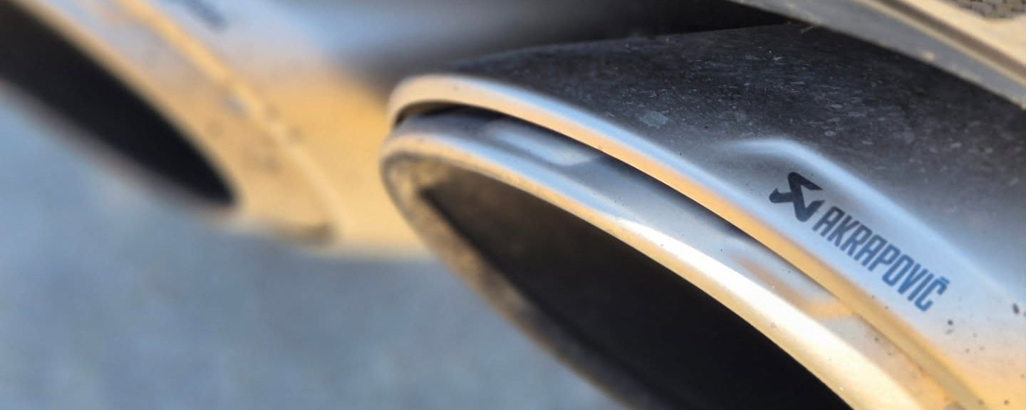 Novitec exhaust system detail on Lamborghini Urus rental SUV in Marbella