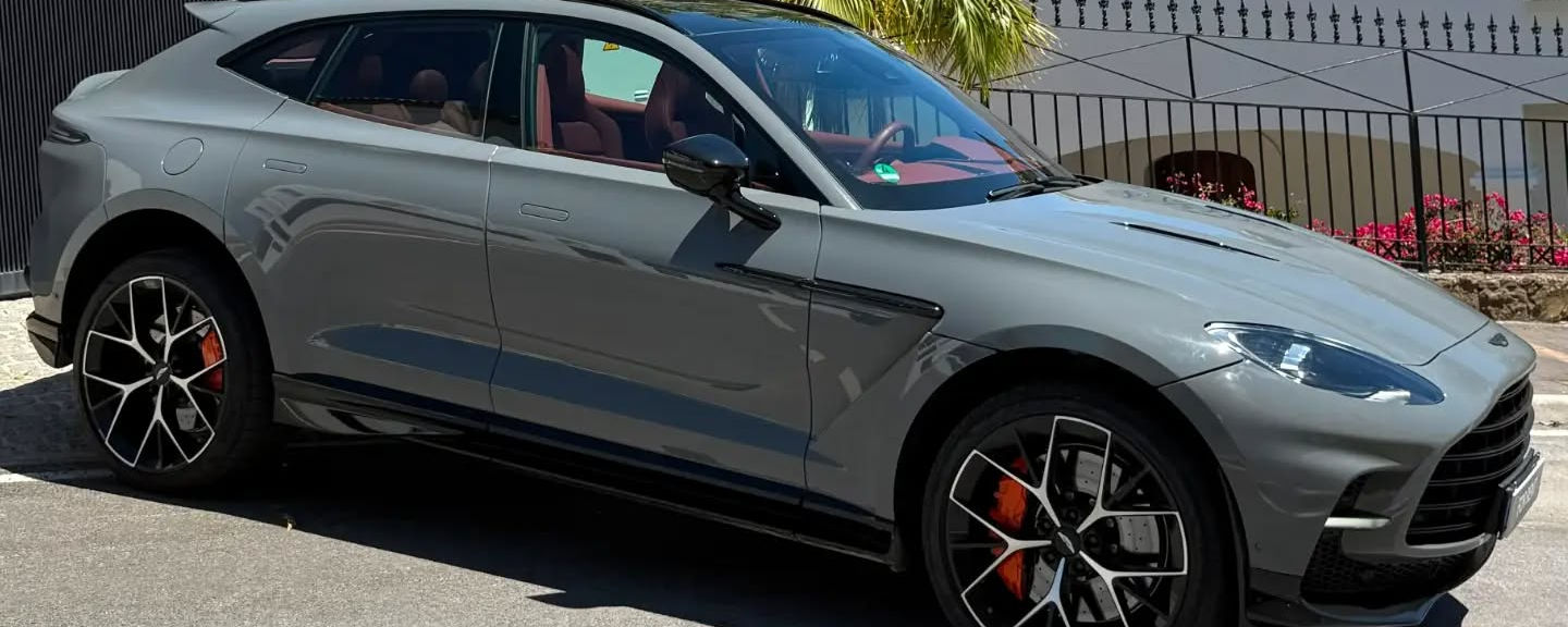Side profile of Aston Martin DBX707 luxury SUV rental in Marbella