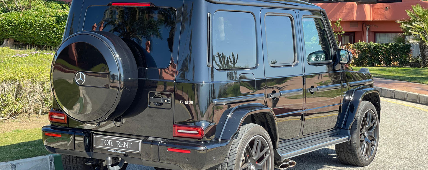 Rear three-quarter view of the black Mercedes-AMG G63 available for rental in Marbella and Costa del Sol.