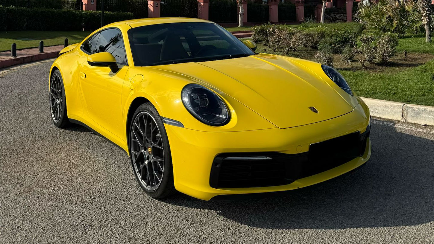 Front view of Porsche 911 Carrera S luxury sports car rental in Marbella
