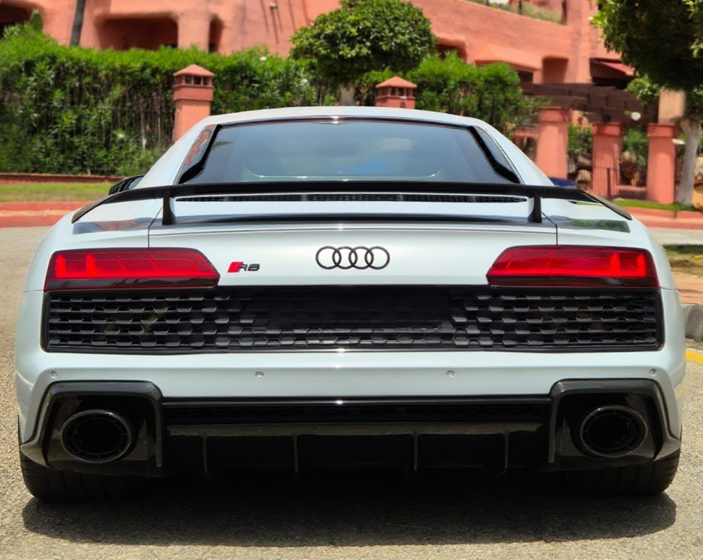 Rear view of Audi R8 V10 performance Carbon Edition coupe with R8 badging, diffuser and twin exhausts visible.
